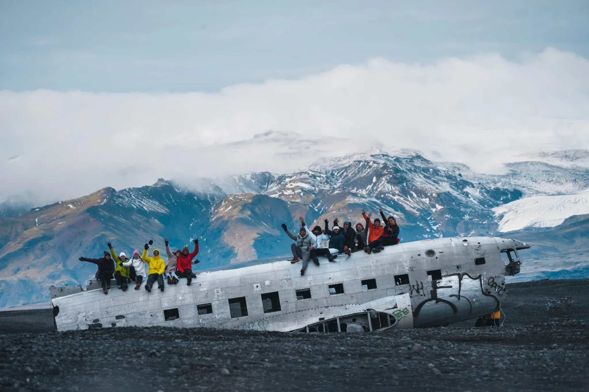 Travel content production beside an aircraft in Iceland